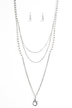 Load image into Gallery viewer, Featuring glassy and opaque finishes, white crystal-like beads join faceted silver beads along shimmery silver chains for a refined look. A lobster clasp hangs from the bottom of the design to allow a name badge or other item to be attached. Features an adjustable clasp closure.  Sold as one individual lanyard. Includes one pair of matching earrings.