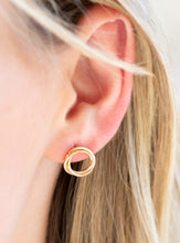 Load image into Gallery viewer, Shimmery gold bars swirl into a dainty hoop for a casual look. Earring attaches to a standard post fitting.  Sold as one pair of post earrings.  Always nickel and lead free.