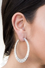 Load image into Gallery viewer, Radiating with hammered detail, an antiqued silver hoop curls around the ear for an artisan inspired look. Earring attaches to a standard post fitting. Hoop measures 2&quot; in diameter.  Sold as one pair of hoop earrings.