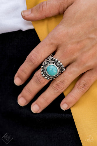 A refreshing turquoise stone is pressed into the center of a round silver frame bordered by shiny silver studs for a rustic look. Features a stretchy band for a flexible fit.   Sold as one individual ring.  Always nickel and lead free.