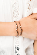 Load image into Gallery viewer, Delicately hammered in antiqued shimmer, glistening copper bars arc across the wrist, coalescing into an airy cuff.