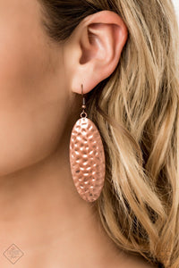 Delicately hammered in shimmery antiqued textures, a glistening copper frame swings boldly from the ear. As the light catches the texture of the design, the result is blinding shimmer that deserves some attention. Earring attaches to a standard fishhook fitting.