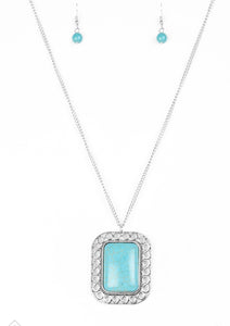 Chiseled into a tranquil rectangle, a turquoise stone is pressed into a shimmery silver frame swirling with texture for an artisan-inspired look. The earthy pendant swings from the bottom of a lengthened silver chain for a seasonal finish. Features an adjustable clasp closure.  Sold as one individual necklace. Includes one pair of matching earrings. 