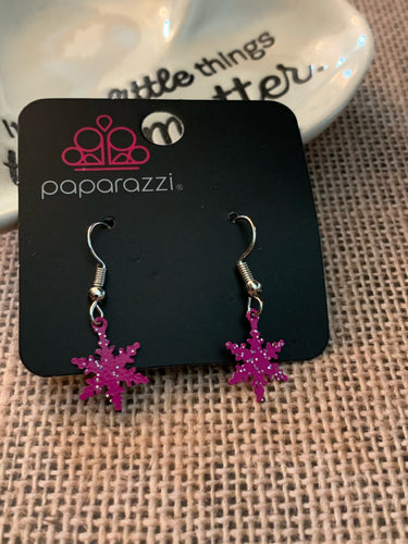 Cute and dainty pink snowflakes swing daintly from the ear.  Earring attaches to a standard fishhook fitting.  Sold as one pair of earrings.  Always nickel and lead free.