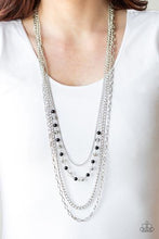 Load image into Gallery viewer, A collection of glistening mismatched silver chains drape across the chest. Dotted with dainty black beads and metallic crystal-like beads, a glittery strand flawlessly drapes across the layers for a timeless finish. Features an adjustable clasp closure.  Sold as one individual necklace. Includes one pair of matching earrings.  Always nickel and lead free.