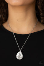 Load image into Gallery viewer, Featuring a sleek silver frame, a dramatic white teardrop gem swings below the collar for a glamorous look. Features an adjustable clasp closure.  Sold as one individual necklace. Includes one pair of matching earrings.