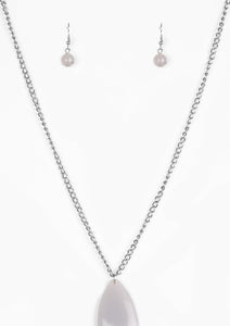 A neutral gray teardrop pendant swings from the bottom of a lengthened silver chain, adding a perfect pop of color to any outfit. Features an adjustable clasp closure.  Sold as one individual necklace. Includes one pair of matching earrings.  Always nickel and lead free.