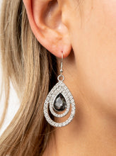Load image into Gallery viewer, An oversized smoky teardrop gem is nestled inside two expansive teardrop frames encrusted in dainty white rhinestones, creating a rippling radiance. Earring attaches to a standard fishhook fitting.  Sold as one pair of earrings.
