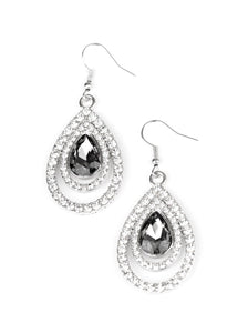 An oversized smoky teardrop gem is nestled inside two expansive teardrop frames encrusted in dainty white rhinestones, creating a rippling radiance. Earring attaches to a standard fishhook fitting.  Sold as one pair of earrings.