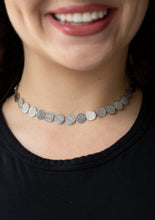 Load image into Gallery viewer, Delicately scratched in linear shimmer, dainty silver discs link around the neck for a blinding metallic look. Features an adjustable clasp closure.  Sold as one individual choker necklace. Includes one pair of matching earrings.