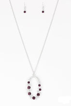 Load image into Gallery viewer, Varying in size, an array of glittery white and purple rhinestones are encrusted along a shimmery silver hoop. The sparkling pendant swings from the bottom of an elongated silver chain for a glamorous finish. Features an adjustable clasp closure.  Sold as one individual necklace. Includes one pair of matching earrings.