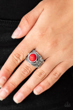 Load image into Gallery viewer, A fiery red stone is pressed into an ornate silver band radiating with rope-like and studded textures for a seasonal look. Features a stretchy band for a flexible fit.  Sold as one individual ring.  Always nickel and lead free.