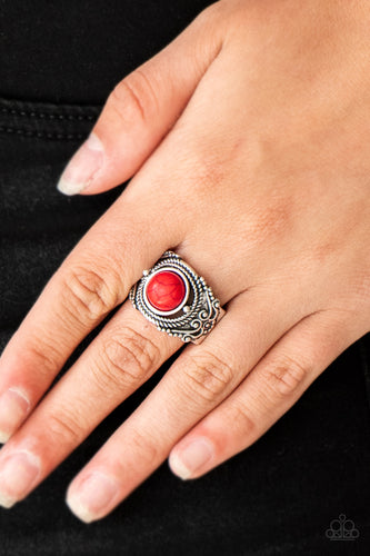 A fiery red stone is pressed into an ornate silver band radiating with rope-like and studded textures for a seasonal look. Features a stretchy band for a flexible fit.  Sold as one individual ring.  Always nickel and lead free.