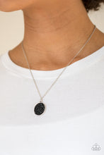 Load image into Gallery viewer, Glittery black rhinestones are sprinkled along an oval silver frame, creating a stellar pendant below the collar. Features an adjustable clasp closure.  Sold as one individual necklace. Includes one pair of matching earrings.  Always nickel and lead free.