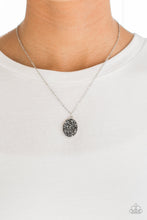 Load image into Gallery viewer, Glittery hematite and smoky rhinestones are sprinkled along an oval silver frame, creating a stellar pendant below the collar. Features an adjustable clasp closure.  Sold as one individual necklace. Includes one pair of matching earrings.  Always nickel and lead free.