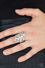 Load image into Gallery viewer, Encrusted in dainty white rhinestones, a collision of shimmery silver stars explode across the finger. Features a stretchy band for a flexible fit.  Sold as one individual ring.  Always nickel and lead free.