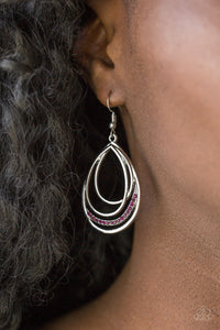 Shiny silver frames layer into an asymmetrical teardrop. A ribbon of glittery purple rhinestones wraps around the bottom for a refined finish. Earring attaches to a standard fishhook fitting.  Sold as one pair of earrings.   Always nickel and lead free.