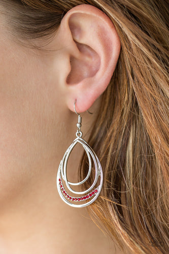 Shiny silver frames layer into an asymmetrical teardrop. A ribbon of glittery red rhinestones wraps around the bottom for a refined finish. Earring attaches to a standard fishhook fitting.  Sold as one pair of earrings.  Always nickel and lead free.