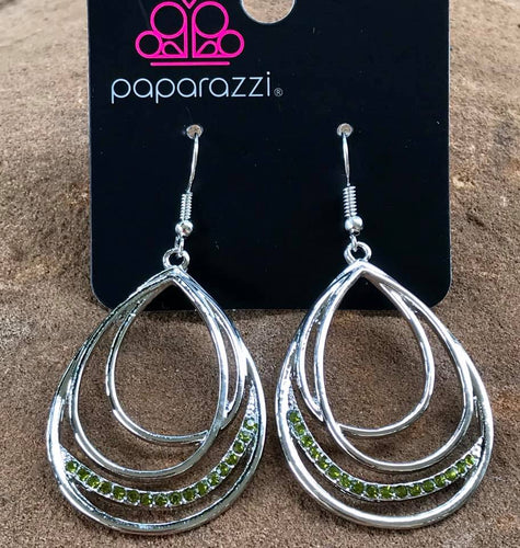   Shiny silver frames layer into an asymmetrical teardrop. A ribbon of glittery green  rhinestones wraps around the bottom for a refined finish. Earring attaches to a standard fishhook fitting.  Sold as one pair of earrings.  Always nickel and lead free.