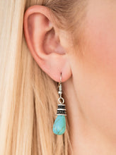 Load image into Gallery viewer, Capped in a studded silver frame, a refreshing turquoise stone teardrop drips from the ear for a seasonal look. Earring attaches to a standard fishhook fitting.  Sold as one pair of earrings.