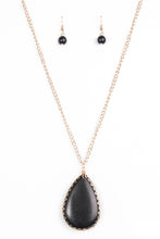 Load image into Gallery viewer, Chiseled into a tranquil teardrop, a smooth black stone swings from the bottom of a glistening gold chain, creating a dramatically earthy pendant. Features an adjustable clasp closure.  Sold as one individual necklace. Includes one pair of matching earrings.