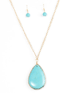 Chiseled into a tranquil teardrop, a smooth turquoise stone swings from the bottom of a glistening gold chain, creating a dramatically earthy pendant. Features an adjustable clasp closure.  Sold as one individual necklace. Includes one pair of matching earrings.