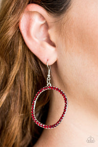 Glittery red rhinestones are encrusted along the front of a warped silver hoop for a refined look. Earring attaches to a standard fishhook fitting.  Sold as one pair of earrings.  Always nickel and lead free.