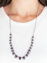 Load image into Gallery viewer, Varying in size, shiny silver beads, textured silver accents, and purple crystal-like beads are threaded along an invisible wire at the bottom of a lengthened silver chain for a refined flair. Features an adjustable clasp closure.  Sold as one individual necklace. Includes one pair of matching earrings. 