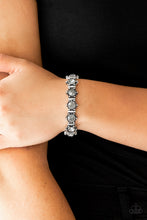 Load image into Gallery viewer, Featuring smoky rhinestone centers, ornate silver frames are threaded along stretchy bands, linking across the wrist for a refined look.  Sold as one individual bracelet  Always nickel and lead free.