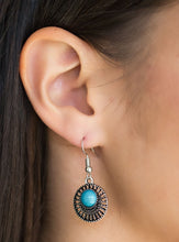 Load image into Gallery viewer, A refreshing blue bead is pressed into an airy silver frame radiating with studded textures for a seasonal look. Earring attaches to a standard fishhook fitting.  Sold as one pair of earrings.