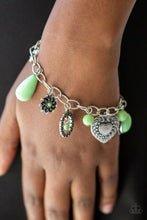 Load image into Gallery viewer, Stunning silver charms featuring charming multiple patterns dangle from a simple silver chain. Infused with green stones create a playful combination. Features an adjustable clasp closure.  Sold as one individual bracelet.  Always nickel and lead free.