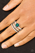 Load image into Gallery viewer, Featuring smooth, hammered, and dotted surfaces, three glistening silver bands stack across the finger. A dainty green bead is pressed into the center of the uppermost band, adding a colorful finish to the seasonal palette. Features a stretchy band for a flexible fit.  Sold as one individual ring.  Always nickel and lead free.