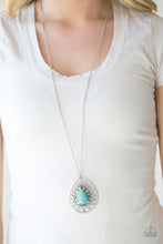 Load image into Gallery viewer, A refreshing turquoise stone is pressed into the center of a large silver teardrop radiating with shimmery sunburst patterns. The tribal inspired pendant swings from the bottom of a lengthened silver chain for a dramatic look. Features an adjustable clasp closure.  Sold as one individual necklace. Includes one pair of matching earrings.  Always nickel and lead free.