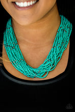 Load image into Gallery viewer, Countless turquoise seed beads drape into a gorgeous layered cascade below the collar. Dainty metallic accents are sprinkled between the colorful beads, adding irresistible hints of shimmer to the seasonal palette. Features an adjustable clasp closure.  Sold as one individual necklace. Includes one pair of matching earrings.  Always nickel and lead free.