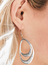 Load image into Gallery viewer, Scratched in shimmery textures, two asymmetrical silver hoops swing from the bottom of a silver link, creating a bold artisan inspired lure. Earring attaches to a standard fishhook fitting.  Sold as one pair of earrings.