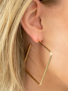 A deceptively simple square frame is tilted on point to create a geometric hoop. Its sharp angles are complemented by its rich gold finish, making a lasting impression. Earring attaches to a standard post fitting. Hoop measures approximately 2" in diameter.