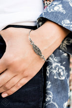 Load image into Gallery viewer, Featuring faceted silver beaded and white rhinestone encrusted centers, rectangular filigree filled silver frames are threaded along a stretchy band around the wrist for a vintage inspired look.