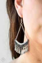 Load image into Gallery viewer, An ornate silver frame is suspended from shimmery silver chains as it dangles from the ear. The floral dotted frame gives way to a fringe of silver beads, adding flirtatious movement to the tribal-inspired piece. Earring attaches to a standard fishhook fitting.