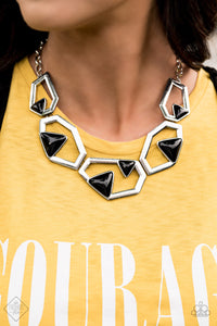 Featuring triangular black beaded accents, a collection of silver geometric frames link below the collar, creating an abstract statement piece with attitude to spare. Features an adjustable clasp closure.
