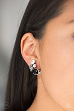 Load image into Gallery viewer, Infused with a dainty white pearl, mismatched black, smoky, and white rhinestones coalesce into a glittery frame. Earring attaches to a standard clip-on fitting.  Sold as one pair of clip-on earrings.     Always nickel and lead free.