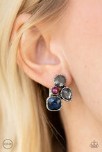 Load image into Gallery viewer, Infused with a dainty purple pearl, mismatched blue, smoky, and hematite rhinestones coalesce into a glittery frame. Earring attaches to a standard clip-on fitting.  Sold as one pair of clip-on earrings.  Always nickel and lead free.  .