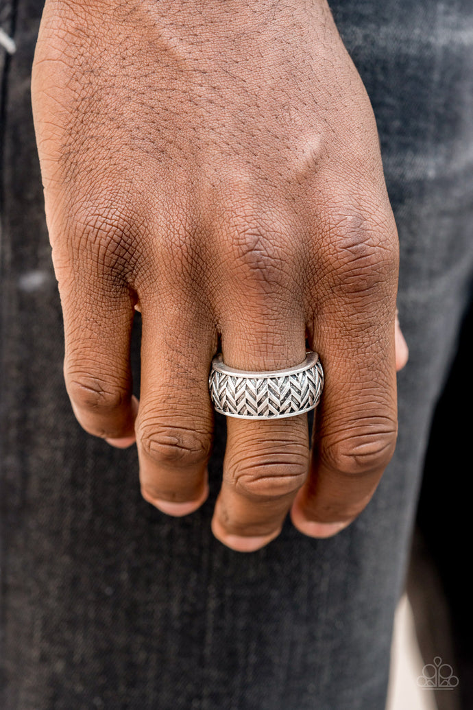The center of a beveled silver band has been delicately hammered in shimmery gold detail for a metro inspired look. Features a stretchy band for a flexible fit.  Sold as one individual ring.  Always nickel and lead free.   