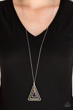 Load image into Gallery viewer, Infused with an elongated silver chain, glistening gold and silver triangular frames layer into a gorgeously stacked pendant for an edgy look. Features an adjustable clasp closure.  Sold as one individual necklace. Includes one pair of matching earrings.  Always nickel and lead free.