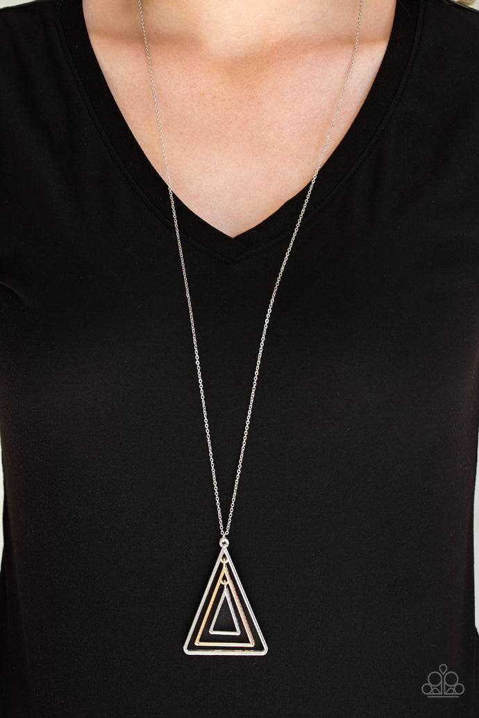 Infused with an elongated silver chain, glistening gold and silver triangular frames layer into a gorgeously stacked pendant for an edgy look. Features an adjustable clasp closure.  Sold as one individual necklace. Includes one pair of matching earrings.  Always nickel and lead free.