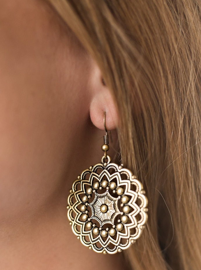 Brushed in an antiqued shimmer, brass bars and brass studs spin into a kaleidoscopic pattern for a whimsical fashion. Earring attaches to a standard fishhook fitting.  Sold as one pair of earrings.   Always nickel and lead free.