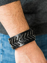 Load image into Gallery viewer, Distressed black leather cording is stitched across the front of a thick leather band for a rugged look. Features an adjustable snap closure.  Sold as one individual bracelet.  