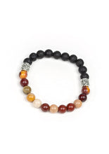 Load image into Gallery viewer,  Infused with dainty silver accents, a collection of black lava rock beads and refreshing stone beads are threaded along a stretchy band around the wrist for a seasonal style.  Sold as one individual bracelet.