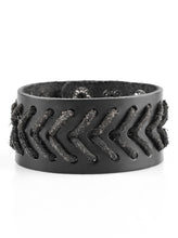 Load image into Gallery viewer, Distressed black leather cording is stitched across the front of a thick leather band for a rugged look. Features an adjustable snap closure.  Sold as one individual bracelet.