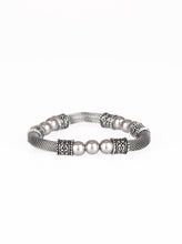 Load image into Gallery viewer, Pearly silver beads, ornate silver accents, and sections of silver mesh chain are threaded along a stretchy band around the wrist for a refined flair.  Sold as one individual bracelet.  