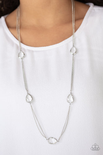 Glassy white teardrops attach to sections of silver chain across the chest, creating a refined display. Features an adjustable clasp closure.  Sold as one individual necklace. Includes one pair of matching earrings.  Always nickel and lead free.